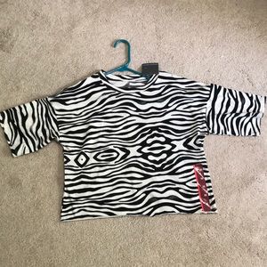 A zebra printed boxed crop top